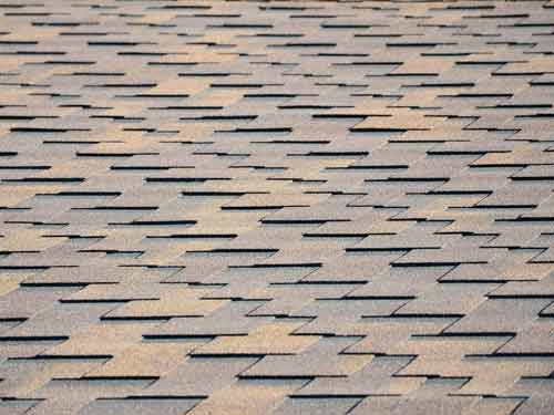 Close-up of textured asphalt shingle roof.
